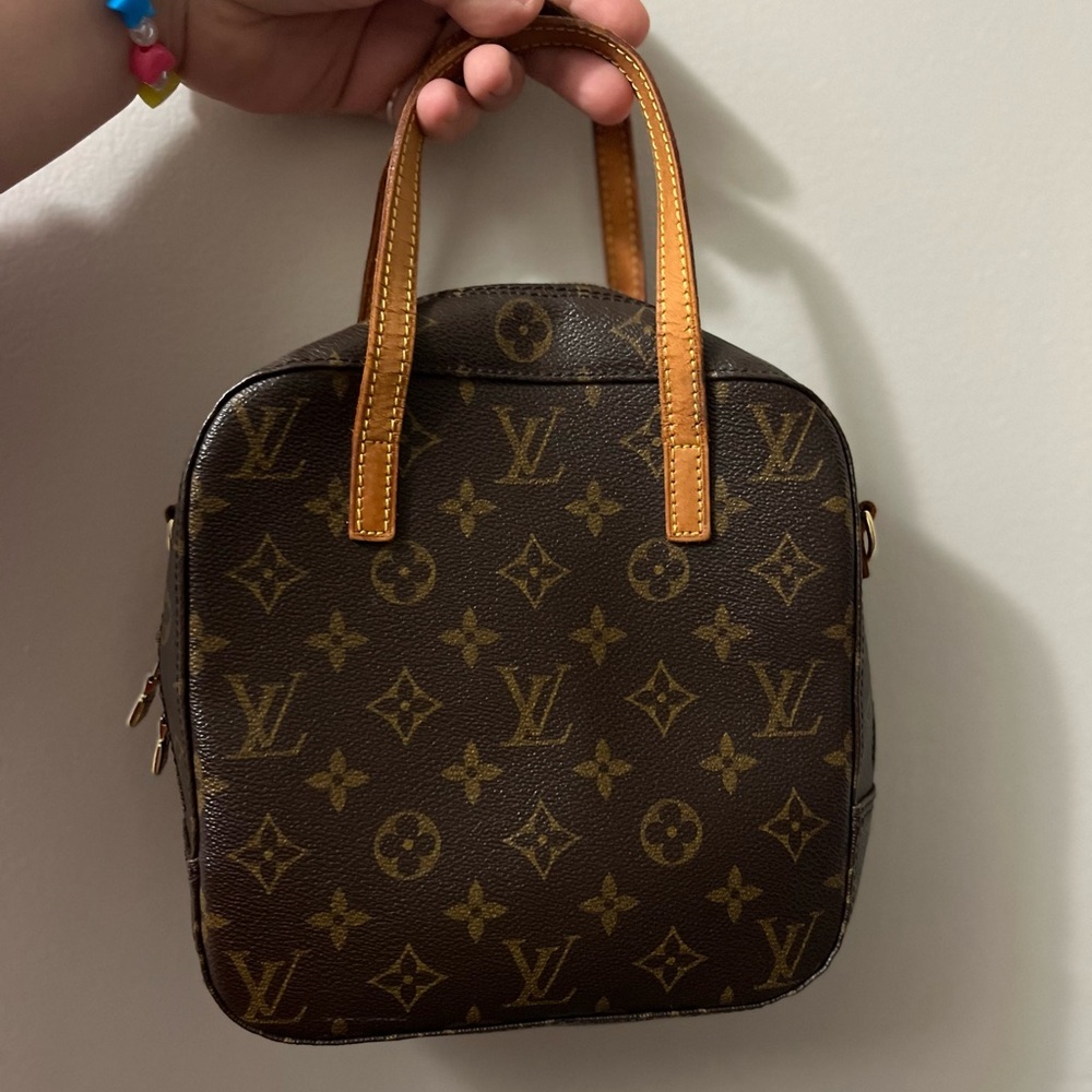Louis Vuitton Brown Mini Bag with Iconic Monogram Pattern and Compact Design